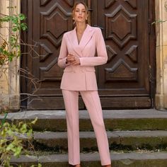 Step into elegance with this stunning women's suit set, featuring a tailored blazer and trousers. Perfect for any professional or formal occasion, this suit is designed to make you stand out with its sophisticated style and impeccable fit.      Tailored blazer with a sleek, double-breasted front and matching trousers for a coordinated look.      Available in Green, Powder and Electric Blue to suit any preference and occasion.       Made from high-quality suit crepe diagonal dense Lu, ensuring du Pink Womens Suit, Womens Suit, Womens Suits, Green Powder, Tailored Blazer, Business Meeting, Suit Set, Office Wear, Sophisticated Style