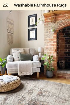 a living room filled with furniture and a fire place in front of a brick fireplace