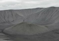 the mountains are covered in sand and gravel as if they were made out of dirt