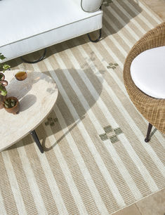 A top view of the Orion rug in a sunny outdoor setting Disc Interiors, Sarah Sherman, Sarah Sherman Samuel, Mantel Mirrors, Dining Design, Long Lumbar Pillow, Lulu And Georgia, Exclusive Furniture, Outdoor Furniture Collections