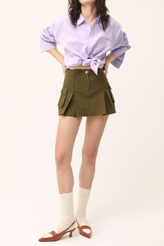 Micro-mini skirt look with lining shorts underneath Faux pocket on the sides Product Specification 97% Cotton 3% Spandex Flat measurement (XS/S) Waist 34cm / hip 43cm / length 35cm (S/M) waist 35.5cm / hip 41cm / length 33cm Professional Clean Only / Do Not Tumble Dry Model's height is 6' 8" (175cm) Bust 31in Waist 23in Hip 34in and wearing XS/S Made in Korea Micro Mini Skirt, Micro Mini, Olive Color, Shorts Skirts, Skorts, White Beige, Best Sellers, Mini Skirt, Cool Outfits