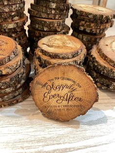 several pieces of wood are stacked on top of each other with the words happily ever after written on them