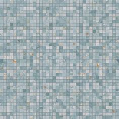 a blue and white tile wallpaper with small squares in the center, as well as gold dots