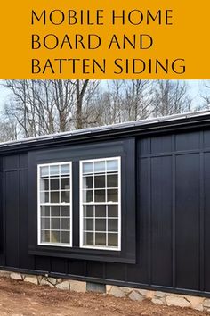 a mobile home with the words mobile home board and batten siding