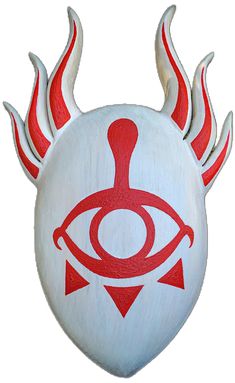 a red and white object with horns on it's head is painted like an eye