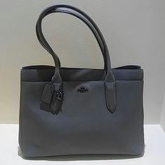 Coach Bailey Style Handbag. A Coach Best Seller. This Bag Is Dark Heather Grey With Gun Metal Hardware. Luxury Gray Bag With Palladium Hardware, Luxury Gray Shoulder Bag With Silver-tone Hardware, Elegant Tote Shoulder Bag With Gunmetal Hardware, Silver Top Handle Bag For Everyday Use, Silver Satchel For Everyday Use, Silver Satchel For Shopping, Classic Gray Bag, Elegant Top Handle Bag With Gunmetal Hardware, Silver Tote Satchel