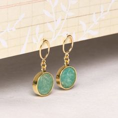 Amazonite Circle Cut Gemstone Drop earrings for her - Green and gold jewelry trend, Delicate, minimalist and modern earrings for her, mom Stone: Genuine Amazonite Bezel: Vermeil Gold Earring, ear-backs and post: 14k Gold Filled Earbacks: Included (14k Gold Filled) Total length of earring: 30mm Circle Gemstone: 12mm diameter About "Gold Filled Jewelry": Also called rolled-gold. These jewelry items are not actually filled with gold. They are made of a base metal covered by sheets of gold in a m... Green And Gold Jewelry, Opening An Etsy Shop, Gemstone Drop Earrings, Amethyst Jewelry, Gold Earring, Affordable Jewelry, Modern Earrings, Agate Pendant, Gold Filled Jewelry