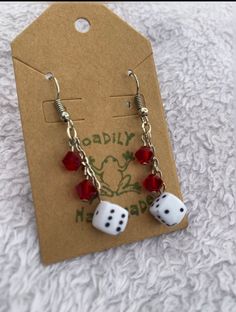 Dangly dice earrings with red diamond-shaped beads. Made with nickle free silvers, and glass dice beads. Red Dangly Earrings, Dice Earrings, Red Diamond, Dangly Earrings, Diamond Shaped, Diamond Shapes, Jewelry Earrings Dangle, Etsy Earrings, Dangle Drop Earrings