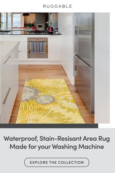 a kitchen with an area rug on the floor