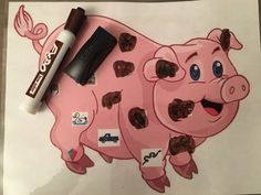 a drawing of a pink pig with chocolate chips on it