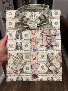 a shirt made out of dollar bills with a bow tie