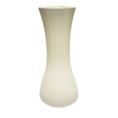 a white vase sitting on top of a table