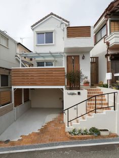 a house with stairs leading up to it