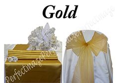 gold and white wedding chair covers with bows on them, next to a present box