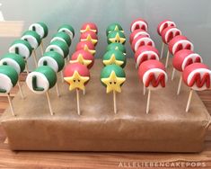 there are many cake pops with different designs on them