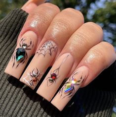 Halloween Nails Acrylic With Rhinestones, Halloween Nails With Rhinestones, Bling Halloween Nails, Halloween Sets Nails, Baddie Halloween Nails, Girly Halloween Nails, Goth Acrylic Nails, Current Nail Trends 2023, October Nails Halloween