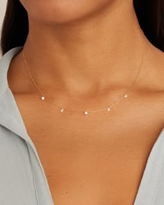 Free from any setting, these diamonds appear to float on your skin and catch the light in the most beautiful way. This diamond necklace features an adjustable gold chain. Wear this floating diamond necklace alone as a solo statement or with the 14k gold Parker Chain Necklace. Floating Diamond Flutter Necklace in 18k Solid Gold, Women's by gorjana Jewelry Necklace Simple, Floating Diamond Necklace, Pretty Jewelry Necklaces, Dainty Diamond Necklace, Gold Necklace Simple, Diamond Necklace Set, Gold Diamond Necklace, Jewelry Lookbook, Girly Jewelry