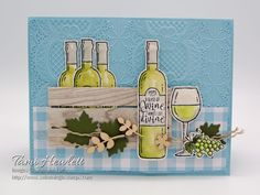 a card with wine bottles and grapes on it