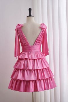 This Pink Plunge Tiered Ruffle Short Homecoming Dress features pink taffeta material, an A-line silhouette, and exquisite details such as bow straps, a ruched top, and a tiered ruffle skirt. The plunging neckline, zip-up back, and above knee length add to the overall elegance of this dress. Item #NP1096 Material: Taffeta Color: Pink Silhouette: A-line Embellishment: Bow straps, ruched tiop, tiered ruffle skirt Neck: Pluge Back: Zip-up back Length: Above knee length Fully lined: Yes Built-in bra: Yes True to size. Made in China. Dresses are usually packed inside out for protection. Hand wash Pink Silhouette, Bow Straps, Pink Homecoming Dress, Dress Item, Tiered Ruffle Skirt, Short Homecoming Dress, Ruched Top, Ruffle Shorts, Ruffle Skirt