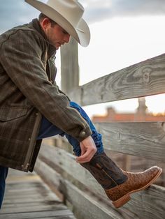 Men's Tan And Blue Square Toe Ostrich Western Boot By Corral A4052 Galant, distinctive, and strong. This attractive embroidered navy blue and Orix brown style are sure to grab the attention of those passing by.The embroidery and woven shaft pattern along the 12-inch shaft show the distinctive elegant style. These eye-catching boots will be the center of attention wherever you take them.You can wear this style all day without worrying about getting tired. It features; sturdy pull-on straps and a Tan Square, Boys Cowboy Boots, Girl Cowboy Boots, Lucchese Boots, Twisted X Boots, Cowboy Boots Mens, Southern Outfits, Country Cowboy, Ostrich Boots