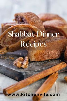 an image of some food that is on a cutting board with cinnamon sticks and nuts