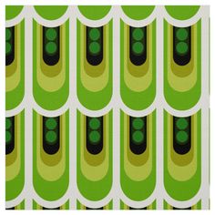 a green and yellow pattern with black dots on the bottom, in an abstract manner