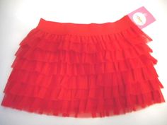 NWT Girls Circo Layered Tutu Skirt. The outside is layered with 100% polyester tulle and the inner lining is 100% cotton. Elastic waistband for proper fit and comfort. Can be worn from casual everyday wear to fancy special occasions. Very Cute!! Available in size 6/6X Layered Tutu Skirt, Girl Tutu Skirt, Tutus For Girls, Tutu Skirt, Casual Everyday, Toddler Girls, Cheer Skirts, Toddler Girl, Ruffles