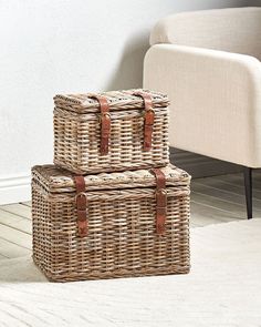 two wicker baskets stacked on top of each other