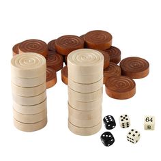 several wooden dices and four black and white dices