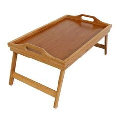 a wooden tray sitting on top of a table