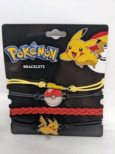 three bracelets with pokemon characters on them