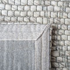 an up close shot of the textured fabric on this bedding is made from natural materials