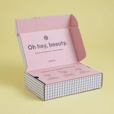 an open pink box with the words oh hey beauty on it's front and inside