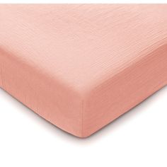 an image of a bed with pink sheets