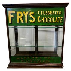 an old fashioned chocolate display case with the words fry's