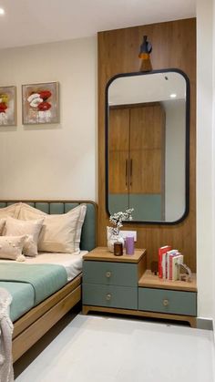 a bed room with a neatly made bed and a mirror on the wall above it