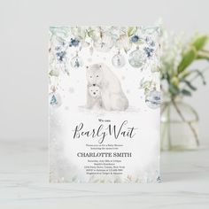 a polar bear and cub are shown on the front of this winter themed baby shower