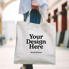 Instantly enhance your online store with our high-quality digital download of this blank tote bag mockup image! Perfect for showcasing your unique designs and artwork. By using our mockups, you can easily place your artwork on the bag and create a stunning visual representation of your products. ⚡ INSTANT DOWNLOAD: Your JPG file at size 3461px x 3461px is instantly downloaded after your payment has cleared with Etsy. No physical product will be sent to you. No refund on digital products. More information about Etsy downloads can be found here: https://www.etsy.com/help/article/3949 If you have trouble using this file, please contact me - I'm happy to help! ⚡ TERMS OF USE: You are allowed to use this product for personal and commercial use. You cannot resell this digital file. By utilising Eco-friendly White Shoulder Bag, White Rectangular Canvas Bag For Personal Use, White Canvas Tote Bag For Personal Use, White Canvas Gift Bag For Personal Use, Rectangular White Canvas Bag For Personal Use, White Tote Bag For Personal Use, Customizable Softback Bag For Daily Use, Customizable Softback Bags For Daily Use, Customizable Shoulder Bag For Daily Use