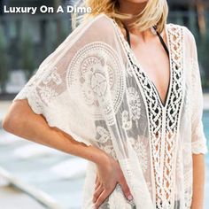 Bohemian Sheer V-neck Cover-up, Bohemian Lace Beach Cover-up, V-neck Beach Dress With Lace Trim As Cover-up, Summer Beachwear Cover-up With Lace Trim, Elegant Long Vacation Cover-up, Bohemian Lace Patchwork Summer Cover-up, Bohemian Lightweight Cover-up For Beach Party, Sheer Lace Beachwear Cover-up, Lace Beachwear Cover-up For Beach