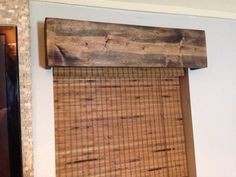 the bamboo blinds are hanging on the wall