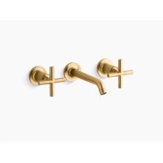 two gold handles on the wall