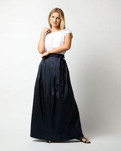 A chic, party-ready wrap skirt that also looks pretty great dressed down for daytime. This one is made of a rich silk shantung from India. It's got an adjustable waist tie that gives you a fantastic, cinched-in shape… we recommend a girly bow, or a big karate-belt knot with the ends hanging loose. It sits high on the waist with a full skirt that gives you plenty of room to move. Belt Knots, Ann Mashburn, Clothing Catalog, Hang Loose, Buckle Shoes, Sweater Gift, Full Skirt, Dressed Down, Wrap Skirt