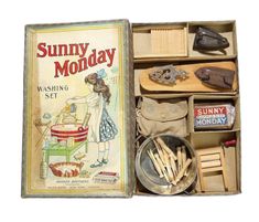 an open box containing various items including shoes and other household goods, with the title sunny monday written on it