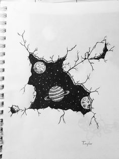 a drawing of the hole in the paper that has planets and saturn on it, as well as stars