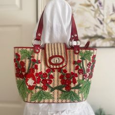 This Beautiful Tote Handbag By Isabella Fiore Features A Stunning Red Exterior With A Flower Made Of Wicker And Leather. The Bag Has A Turn Lock Closure And Double Handles With A 8 Inch Drop. It Measures 12 Inches In Width, 7 Inches In Height, And 4 Inches In Depth. The Bag Is Lined With Red Cotton And Has A Small Size, Making It Perfect For Parties Or Casual Outings. The Hardware Is Silver In Color And The Bag Is Vintage With A Flower Theme. The Product Line Is Isabella Fiore And The Bag Is Han Sequin Handbag, Hobo Tote Bag, Braided Leather Belt, Girls Tote, Black Leather Tote Bag, Leather Floral, Tote Bag Purse, Leather Flowers, Large Shoulder Bags