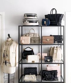 a rack with purses and handbags on it