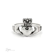 Silver Claddagh Ring featuring a heart held by two hands with a crown on top Irish Heart Ring, Irish Heart, Silver Claddagh Ring, Heart Rings, Claddagh Ring, Symbol Of Love, Claddagh Rings, Irish Heritage, Love Symbols