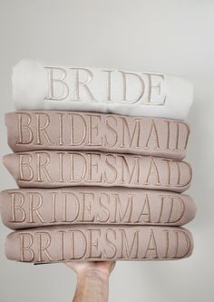 the bride towels are stacked on top of each other