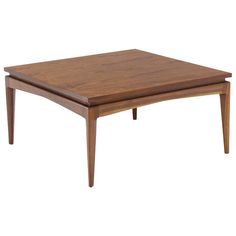 a wooden coffee table with two legs and a square top on the bottom, in front of a white background