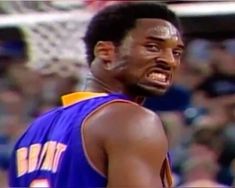 an image of a man that is in the middle of a basketball game with his mouth open